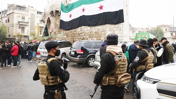 Lực lượng an ninh Syria bảo vệ một sự kiện tại Thủ đô Damas. Ảnh: CNN