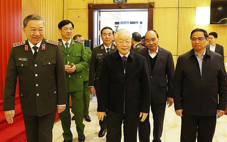 Tổng Bí thư Nguyễn Phú Trọng cùng Chủ tịch nước Nguyễn Xuân Phúc, Thủ tướng Phạm Minh Chính đến dự hội nghị. (Ảnh TTXVN)