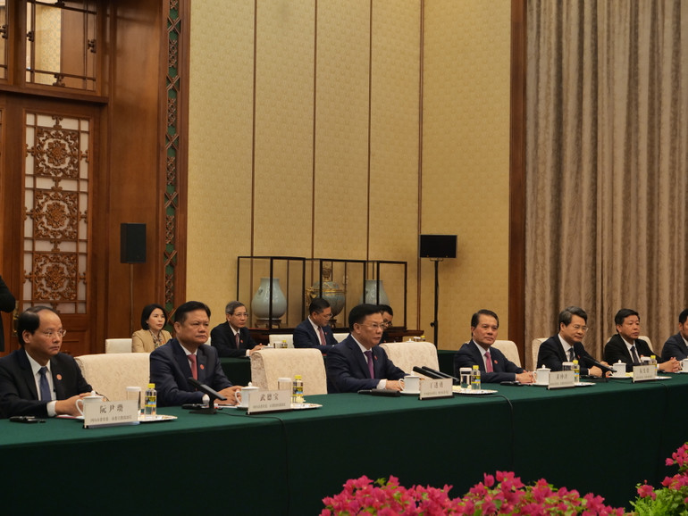 Đoàn đại biểu cấp cao thành phố Hà Nội tại cuộc tiếp. (Ảnh: HỮU HƯNG)