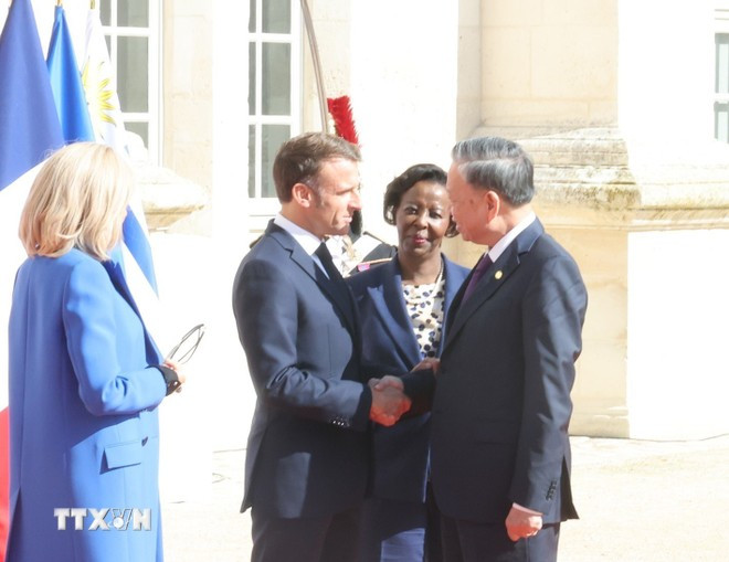 Tổng thống Cộng hòa Pháp Emmanuel Macron và Tổng Thư ký Pháp ngữ Louise Mushikiwabo đón Tổng Bí thư, Chủ tịch nước Tô Lâm.