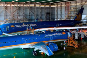 Tách bạch việc sử dụng nguồn lực nhà nước trong cung cấp dịch vụ công, thực hiện nhiệm vụ chính trị với các hoạt động kinh doanh sẽ tạo cơ sở để nâng cao hiệu quả hoạt động của doanh nghiệp nhà nước. (Ảnh Khiếu Minh)