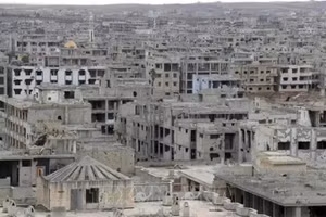Những tòa nhà ở thành phố Daraa, Syria bị tàn phá do chiến sự. (Ảnh: THX/TTXVN)