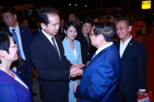 Lễ tiễn Thủ tướng Phạm Minh Chính kết thúc chuyến tham dự Hội nghị WEF 16 Thiên Tân và làm việc tại Trung Quốc. Ảnh: Dương Giang/TTXVN