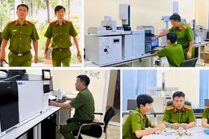 Thượng tá Nguyễn Hoàng Hà, Phó Phân viện trưởng Phân viện Khoa học hình sự tại Thành phố Hồ Chí Minh (C09B) và đồng nghiệp.