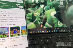 Ủy ban Cạnh tranh quốc gia xử phạt Grab 1,36 tỷ đồng. (Ảnh: KIM DUNG)