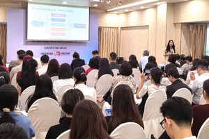 Hội nghị giới thiệu những điểm mới của Luật Thương mại điện tử và các văn bản hướng dẫn thi hành. (Ảnh: KIM DUNG)