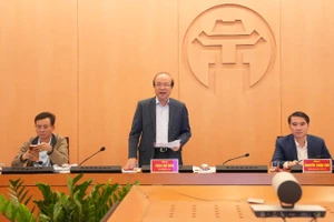 Thứ trưởng Tư pháp Phan Chí Hiếu làm việc tại Hà Nội.