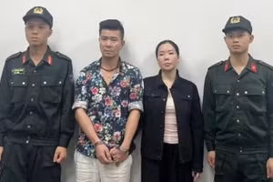 Bị can Nguyễn Thị Mai Anh và Lê Văn Đông. (Ảnh: Bộ Công an)