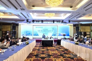 Hội thảo "Hợp tác kinh tế quốc tế về năng lượng và thương mại tự do". (Ảnh: AN NGUYÊN)