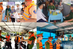Lực lượng Công an Cần Thơ tuyên truyền, hướng dẫn, kiểm tra và tổ chức ký cam kết bảo đảm an toàn giao thông đường thủy. (Ảnh: Công an cung cấp)