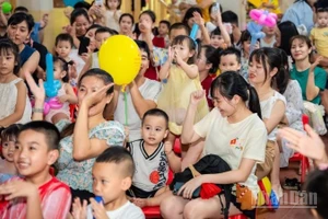 Nụ cười trẻ thơ. (Ảnh: HNV)