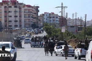 Lực lượng an ninh Syria tiến vào thành phố Sweida ở miền nam nước này. (Ảnh: THX/TTXVN)