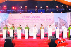 Công ty cổ phần Pearl Land khởi công dự án xây dựng nhà ở cho lực lượng vũ trang Công an nhân dân tại khu dân cư 28 ha, xã Hiệp Phước, Thành phố Hồ Chí Minh (Ảnh QUANG QUÝ)