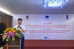 Ông Nguyễn Ngọc Vũ, Phó Cục trưởng Đăng ký giao dịch bảo đảm và Bồi thường nhà nước phát biểu tại hội nghị.