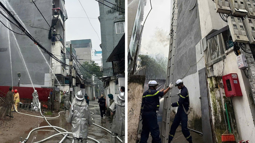 Lực lượng chức năng chữa cháy nhà trong ngách sâu ngõ hẹp. (Ảnh: Công an thành phố Hà Nội )