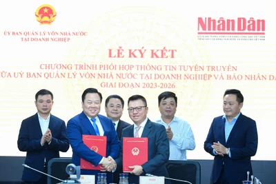 Báo Nhân Dân và Ủy ban Quản lý vốn nhà nước tại doanh nghiệp ký kết chương trình phối hợp thông tin, tuyên truyền