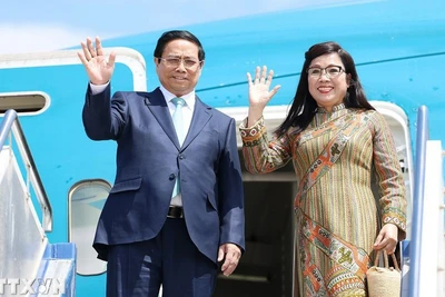 Thủ tướng Phạm Minh Chính và Phu nhân. (Nguồn: TTXVN)