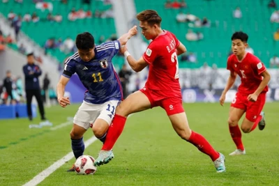 Đội tuyển Việt Nam thi đấu kiên cường trước đội tuyển Nhật Bản. (Ảnh: Reuters)