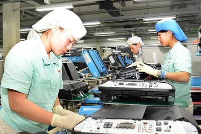 Lao động tại Công ty TNHH Canon Việt Nam, Khu công nghiệp Thăng Long, Hà Nội. (Ảnh: ĐĂNG ANH)