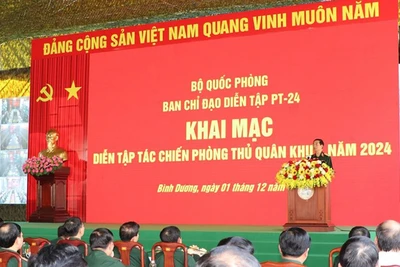Toàn cảnh buổi khai mạc diễn tập tác chiến phòng thủ Quân khu 7 năm 2024. (Ảnh: Huyền Trang/TTXVN)
