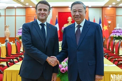 Tổng Bí thư Tô Lâm và Tổng thống Pháp Emmanuel Macron. (Ảnh: TRẦN HẢI)