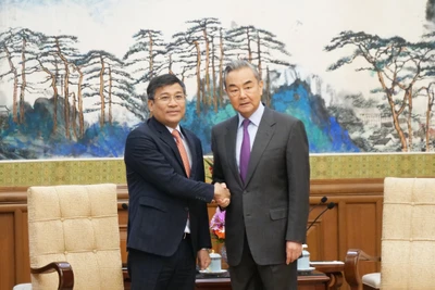 Thứ trưởng Thường trực Bộ Ngoại giao Nguyễn Minh Vũ và Ủy viên Bộ Chính trị, Chủ nhiệm Văn phòng Ủy ban công tác đối ngoại Trung ương, Bộ trưởng Ngoại giao Trung Quốc Vương Nghị.