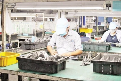 Doanh nghiệp sản xuất, kinh doanh hàng hóa xuất khẩu có nhu cầu vay vốn lớn. (Ảnh: THẾ ANH)