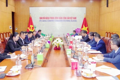 Đoàn đại biểu Ban Đối ngoại Trung ương Đảng Cộng sản Việt Nam hội đàm với Đoàn đại biểu Ban Đối ngoại Trung ương Đảng Nhân dân Cách mạng Lào. Ảnh: dangcongsan.vn