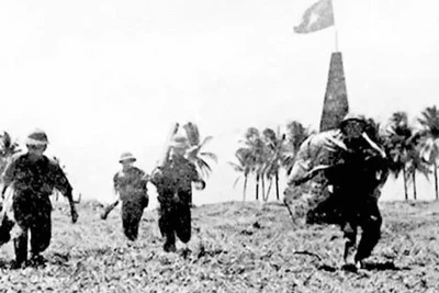 Quân ta tiến công đảo Song Tử Tây. (Ảnh: TTXVN)