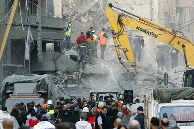 Vùng ngoại ô Beirut chịu thiệt hại sau vụ không kích. (Ảnh REUTERS)