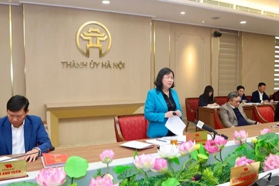 Đồng chí Bùi Thị Minh Hoài phát biểu kết luận hội nghị chiều 7/3.