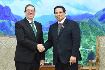 Thủ tướng Phạm Minh Chính và đồng chí Bruno Rodríguez Parrilla, Ủy viên Bộ Chính trị, Bộ trưởng Ngoại giao Cuba. (Ảnh: TRẦN HẢI)