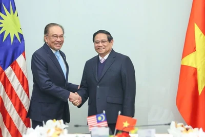 Thủ tướng Chính phủ Phạm Minh Chính và Thủ tướng Malaysia Anwar Ibrahim. (Ảnh: TRẦN HẢI)