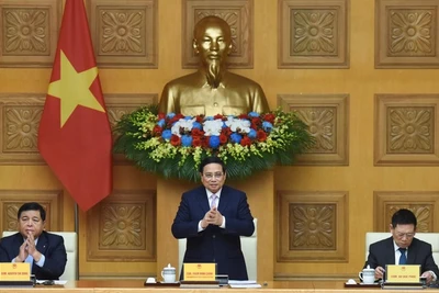 Thủ tướng Phạm Minh Chính chủ trì cuộc Tọa đàm với doanh nghiệp Trung quốc (Ảnh: TRẦN HẢI). 