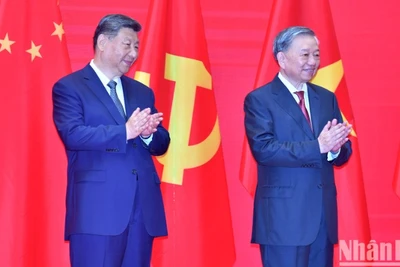 Tổng Bí thư Tô Lâm và Tổng Bí thư, Chủ tịch Trung Quốc Tập Cận Bình tại Gặp gỡ hữu nghị nhân dân Việt Nam-Trung Quốc. (Ảnh: ĐĂNG KHOA) 