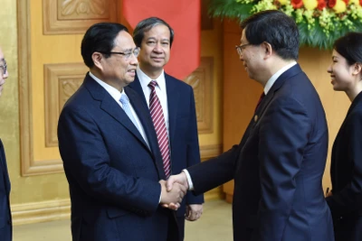 Thủ tướng Phạm Minh Chính tiếp đồng chí Khưu Dũng, Bí thư Đảng ủy Đại học Thanh Hoa, Trung Quốc.