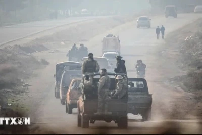 Các thành viên thuộc các nhóm vũ trang tiến về miền Bắc Syria. (Ảnh minh họa: AA/TTXVN)