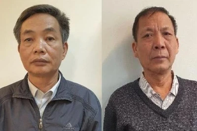 Bị can Đặng Ngọc Cầm (bên trái) và bị can Nguyễn Quốc Khánh (bên phải).