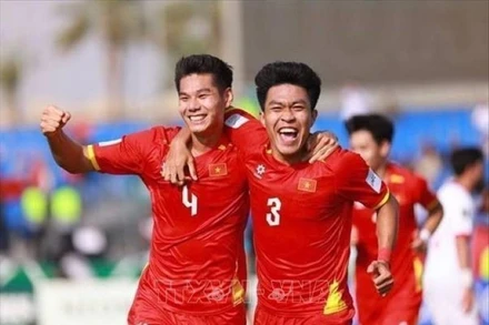 Trung vệ Hiểu Minh ghi bàn nâng tỷ số 2-0 cho U23 Việt Nam trong trận đấu với Jordan tối 6/1. (Ảnh: AFC/TTXVN)