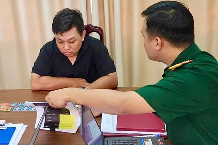 Đối tượng Đặng Ngọc Minh tại cơ quan điều tra.