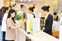 Khách hàng giao dịch tại một điểm của Ngân hàng Thương mại cổ phần Nam Á (NamA Bank) trên địa bàn Thành phố Hồ Chí Minh.