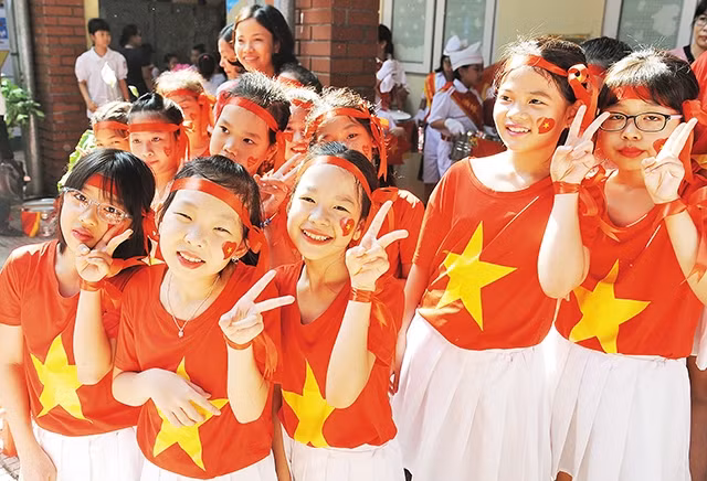 Niềm vui ngày khai trường.Ảnh | Trần Hải