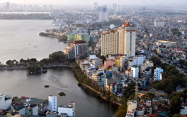 Phát triển công trình xanh sẽ là giải pháp bền vững cho việc giải quyết các vấn đề ô nhiễm môi trường, nâng cao chất lượng cuộc sống người dân đô thị. Ảnh: Ðăng Khoa