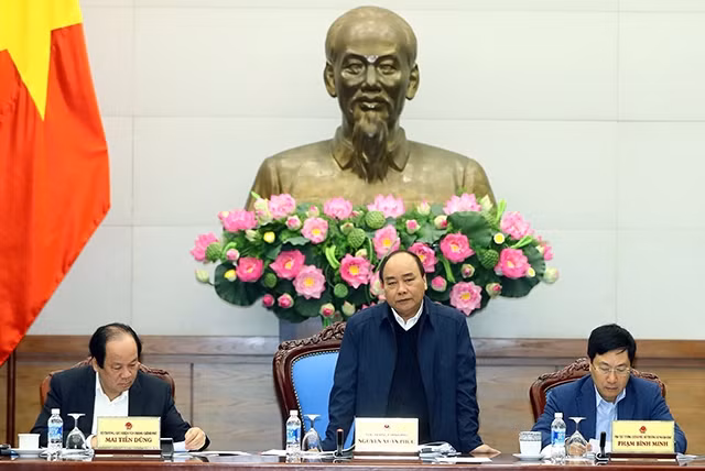 Thủ tướng Nguyễn Xuân Phúc phát biểu chỉ đạo tại cuộc họp về tình hình triển khai hợp tác với Lào. Ảnh: THỐNG NHẤT (TTXVN)