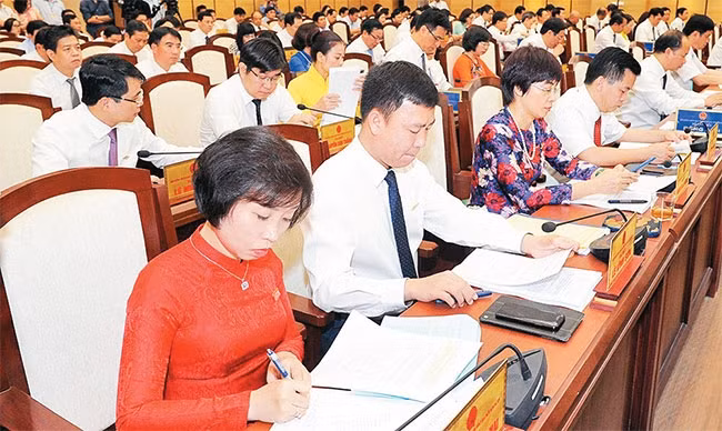 Các đại biểu tham dự kỳ họp thứ sáu Hội đồng nhân dân thành phố khóa 15. Ảnh: MINH HÀ