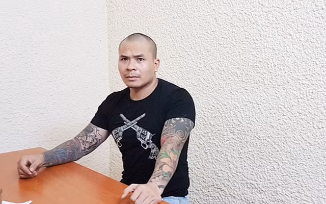 Đối tượng Quang tại trụ sở cơ quan điều tra.