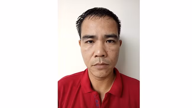 Đối tượng Lê Minh Tuấn tại cơ quan công an.