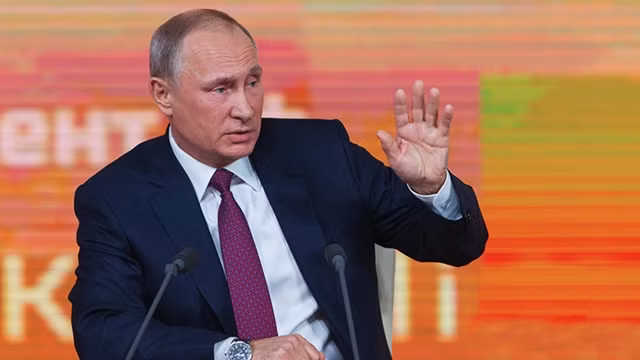Tổng thống Putin trong phiên họp báo ngày 14-12. Ảnh: NEW CHINA