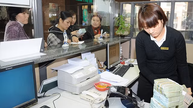 Tháng 2-2018, tín dụng ước tăng khoảng 1% so cuối năm 2017. Ảnh: NAM HẢI