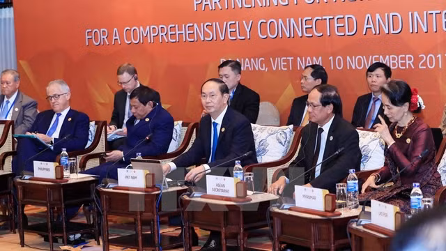 Chủ tịch nước Trần Đại Quang (giữa) phát biểu. (Ảnh: TTXVN)